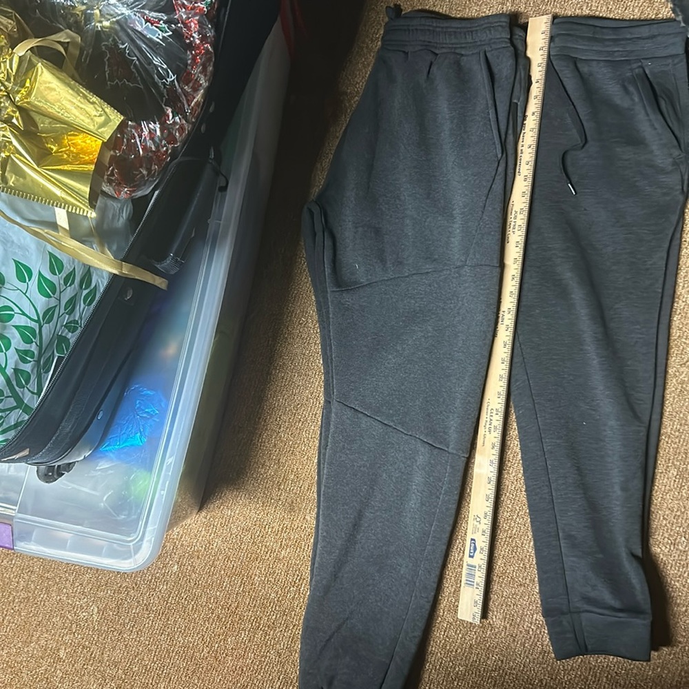 2 preowned mens sweatpants. 1 large, 1 medium